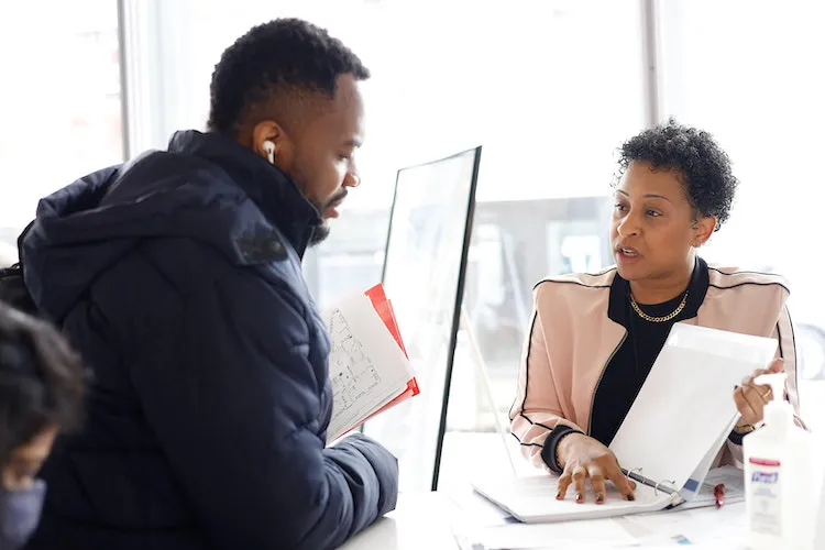 Conversation between two people at Career Expo