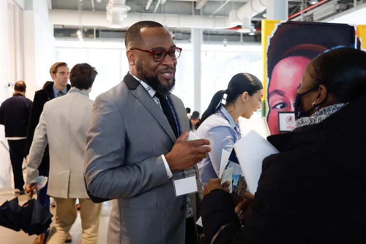 Conversation between people at Career Expo